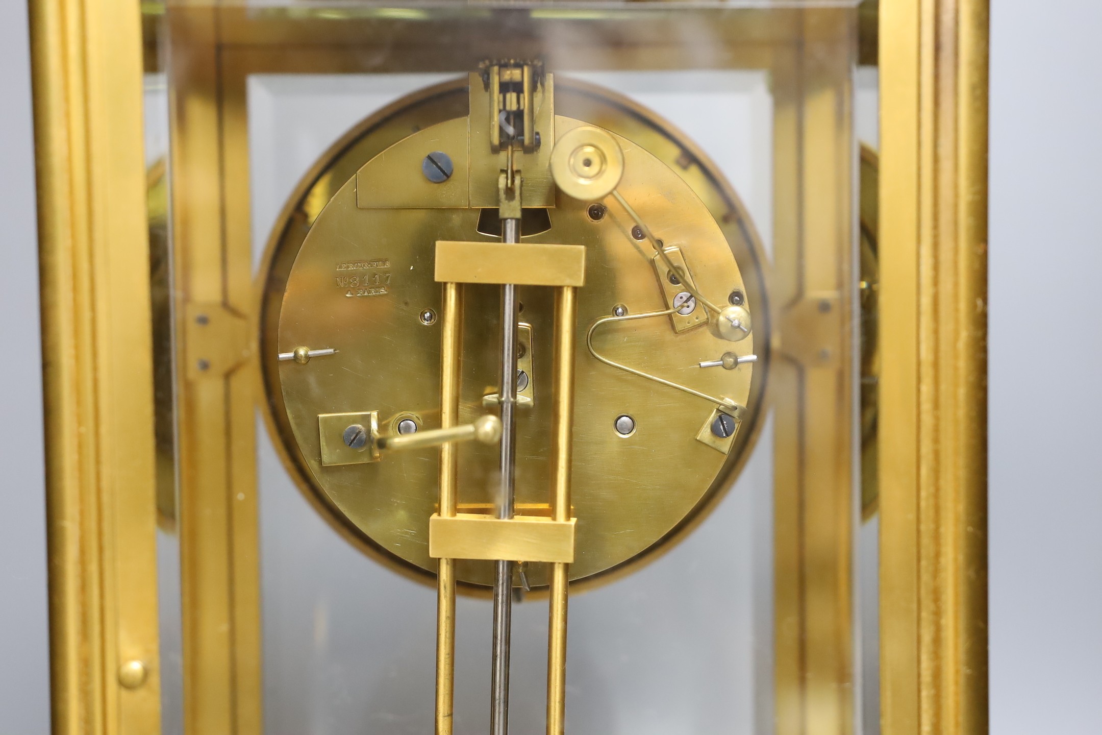 A large gilt framed four glass mantel clock by Le Roy & Fils of London. 36cm tall